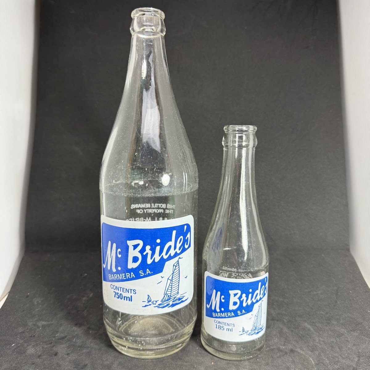 2 Ceramic Label Crown Seals. Both McBride's, L. W. & B. L. McBride, Cordial & Ice Works, Barmera. 750 ml & 185 ml. (South Australia)