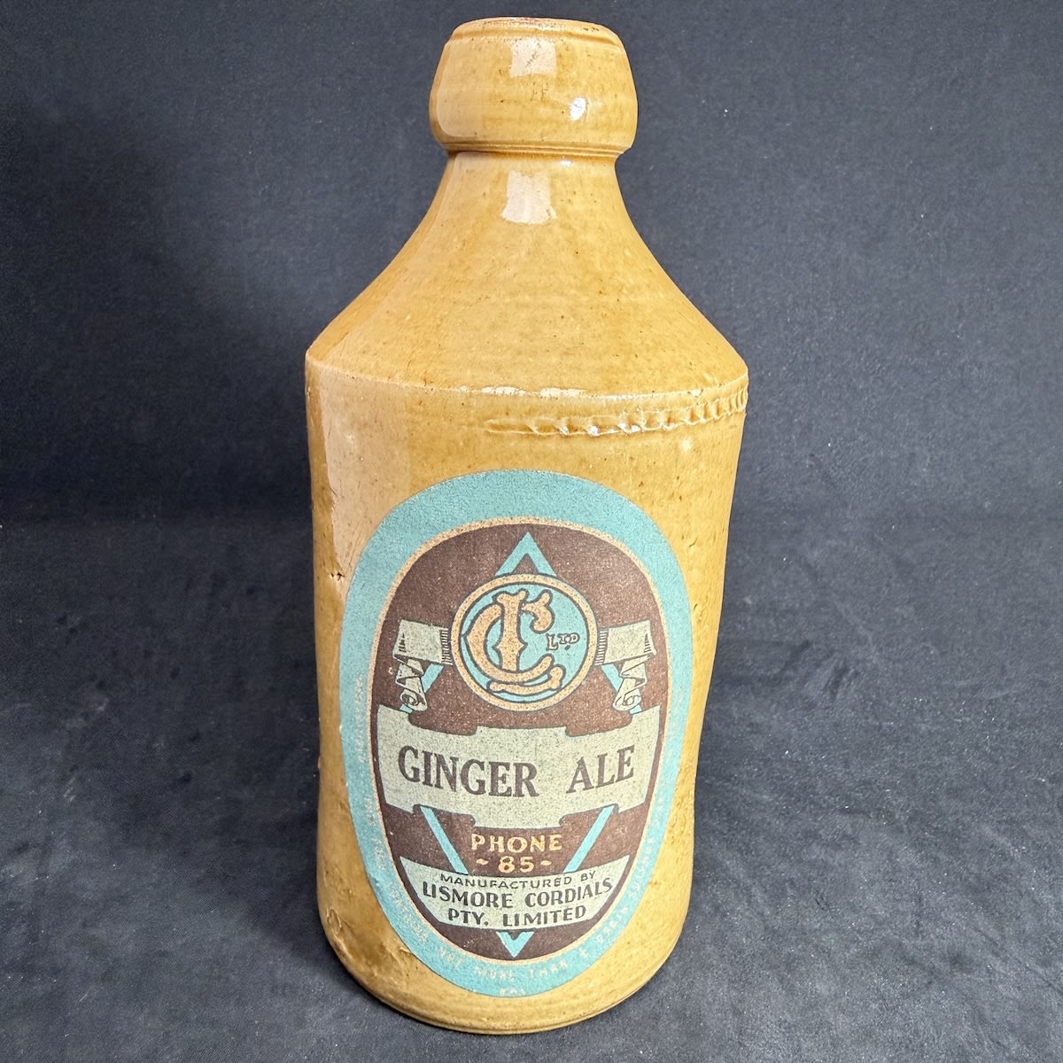 Ginger Beer with a label. Plain dump all tan ginger beer. Label for Lismore Cordials Pty Ltd Ginger Ale. (New South Wales)