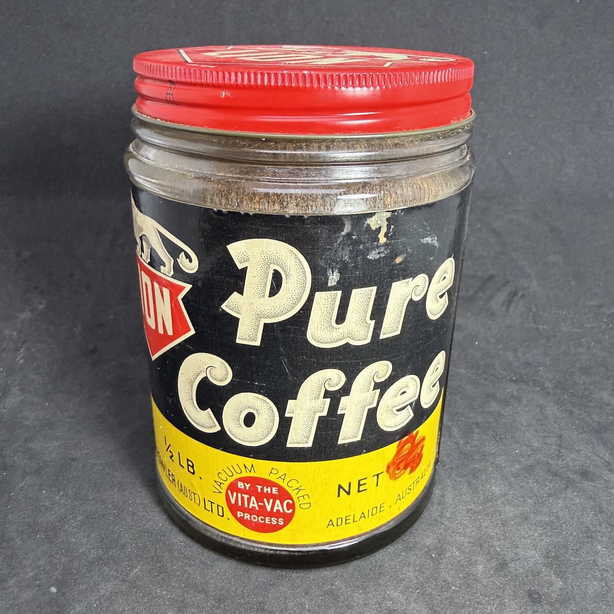 Embossed and labelled jar. Lion Brand Pure Coffee. D. & J. Fowler Ltd, Adelaide. Original lid and contents! (South Australia)