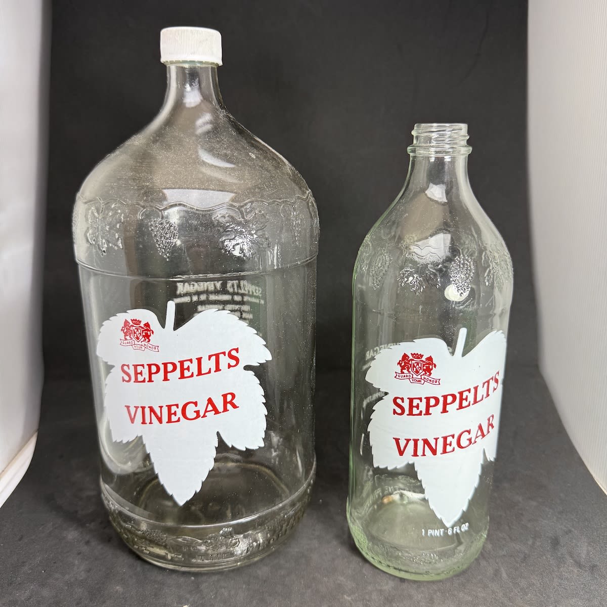 2 Ceramic Label Seppelts Vinegar bottles. Guard Your Honor logo. B. Seppelt & Sons Ltd Seppeltsfield. Half Gallon & 26 oz Fancy bottles. (South Australia)