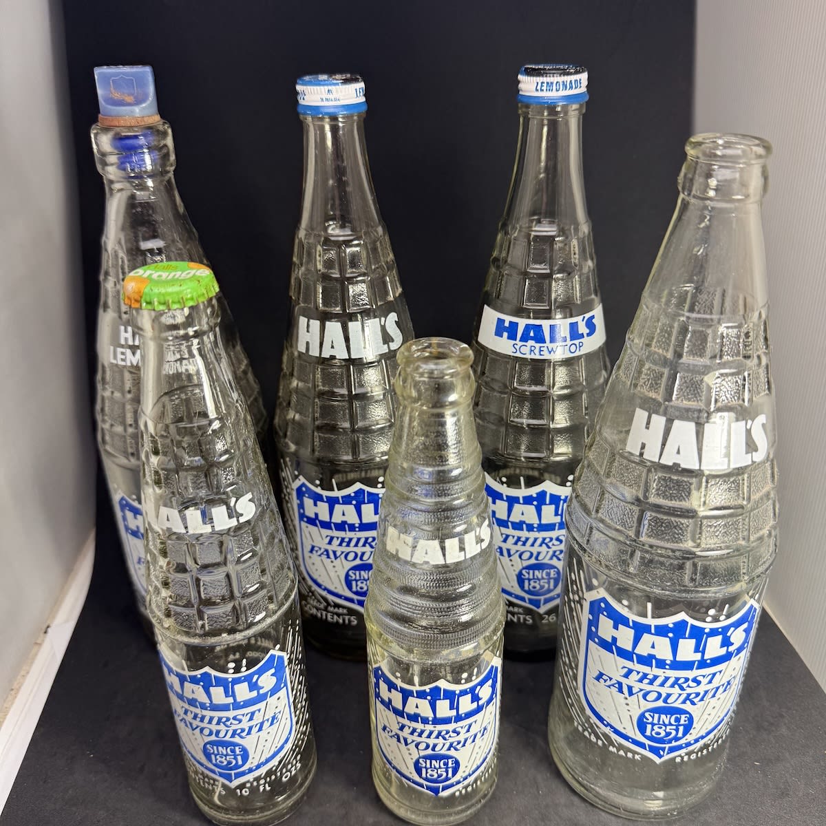 6 different Hall's Thirst Favourite Since 1851 Ceramic Label Bottles. Geo. Hall & Sons Ltd Norwood. Internal Thread, Crown Seals & Screw Tops. (South Australia)