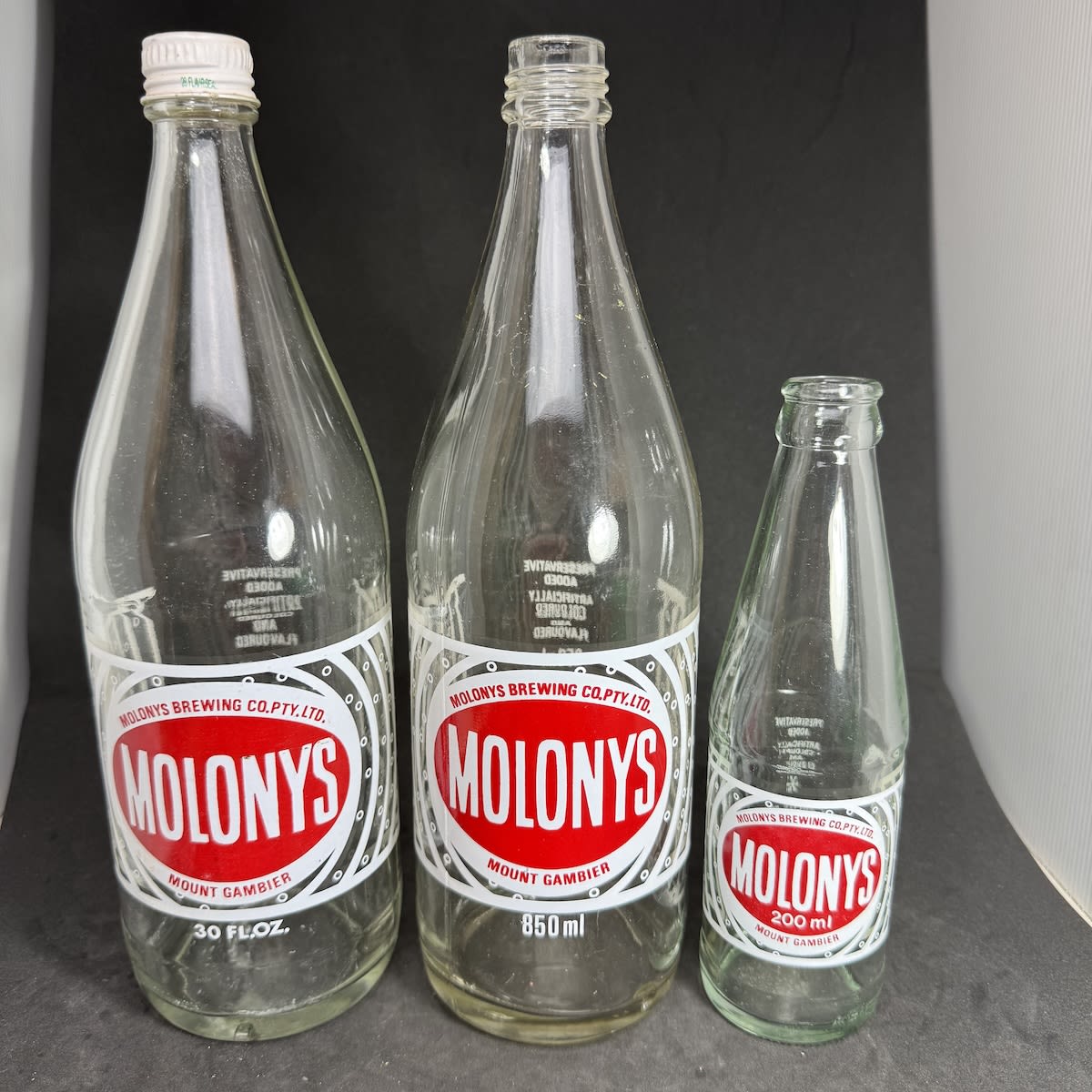 3 Ceramic Label Aerated Waters: All Molonys Brewing Co Pty Ltd Mount Gambier. 30 oz and 850 ml screw tops 200 ml crown seal. (South Australia)