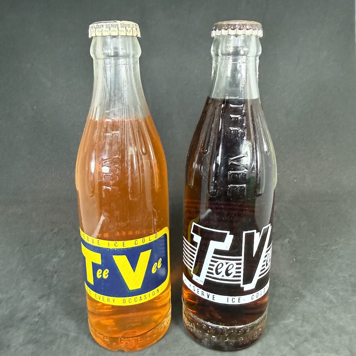 2 Ceramic Label Crown Seals. Different varieties of Tee Vee Drinks Geelong. W. F. Winter. Still sealed with contents. (Victoria)