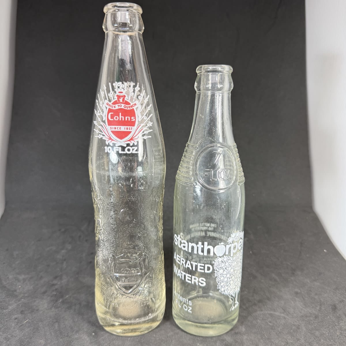 2 Ceramic Label Crown Seals: Cohns, Cohn Bros Ltd 10 oz; Stanthorpe Aerated Waters, Bullet type, 7 oz.