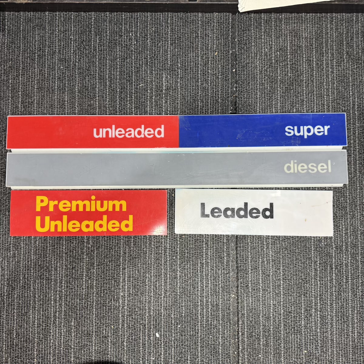 4 Heavy plastic Petrol Bowser ID signs: Premium Unleaded; Leaded; unleaded, super; diesel.