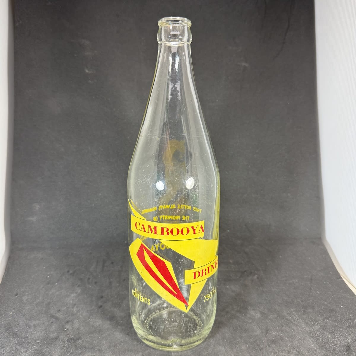 Ceramic Label Crown Seal. Cambooya Drinks. 750 ml. Yellow & Red Print. (Queensland)