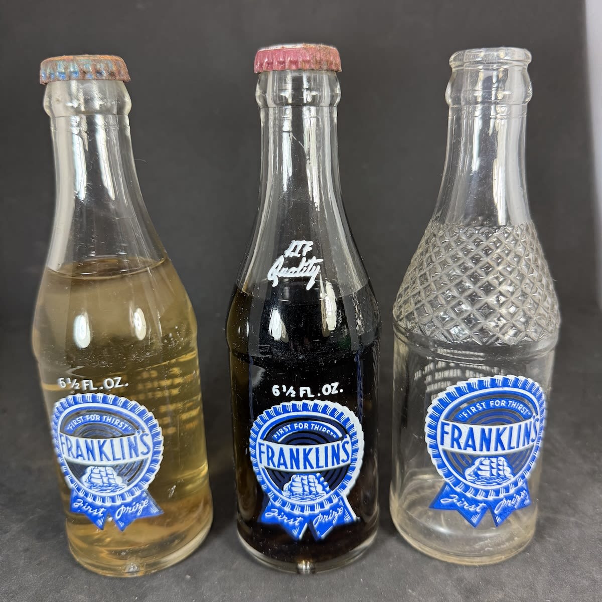 3 Franklins Geelong small Ceramic Label Crown Seals. J. T. Franklin & Co Pty Ltd. Ship. All different. One sealed with Franklins Ginger Beer cap; one with Kola cap. (Victoria)