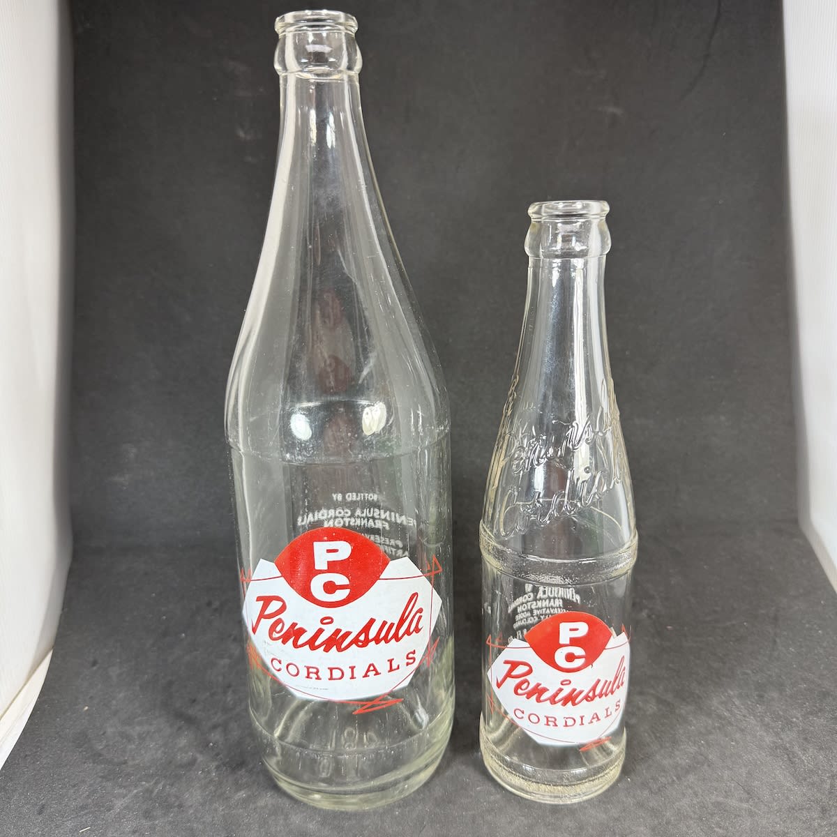 2 Peninsula Cordials Frankston Ceramic Label Crown Seals. 26 oz & 8 oz. Red & White Prints. (Victoria)