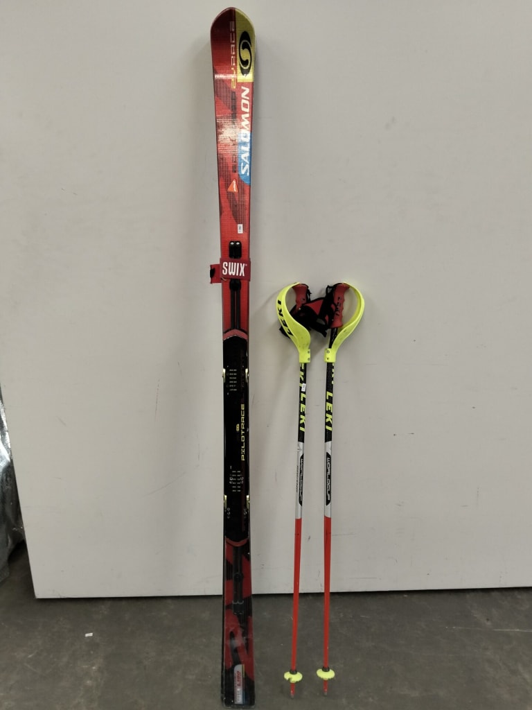 SALOMON EQUIPE 102V RACE SKIS AND POLES — NZ auction result