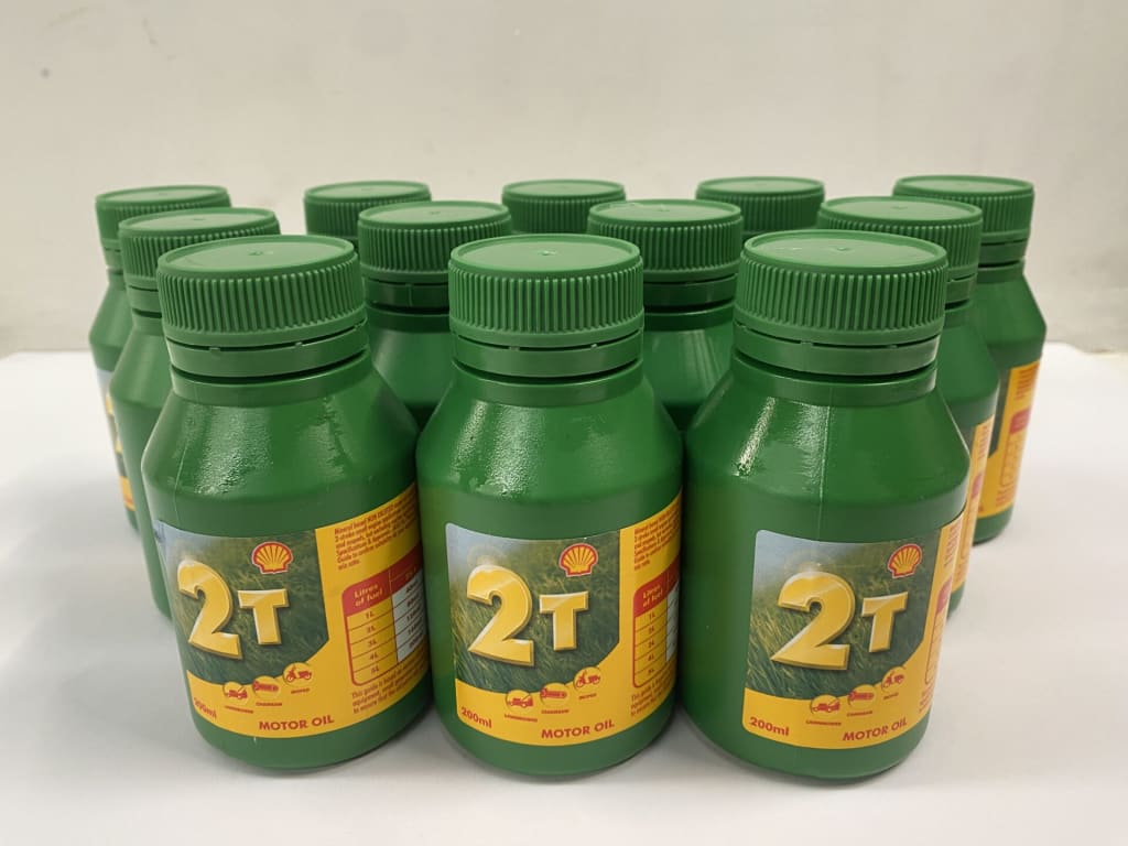 12 BOTTLES SHELL 2 STROKE ENGINE OIL — NZ auction result