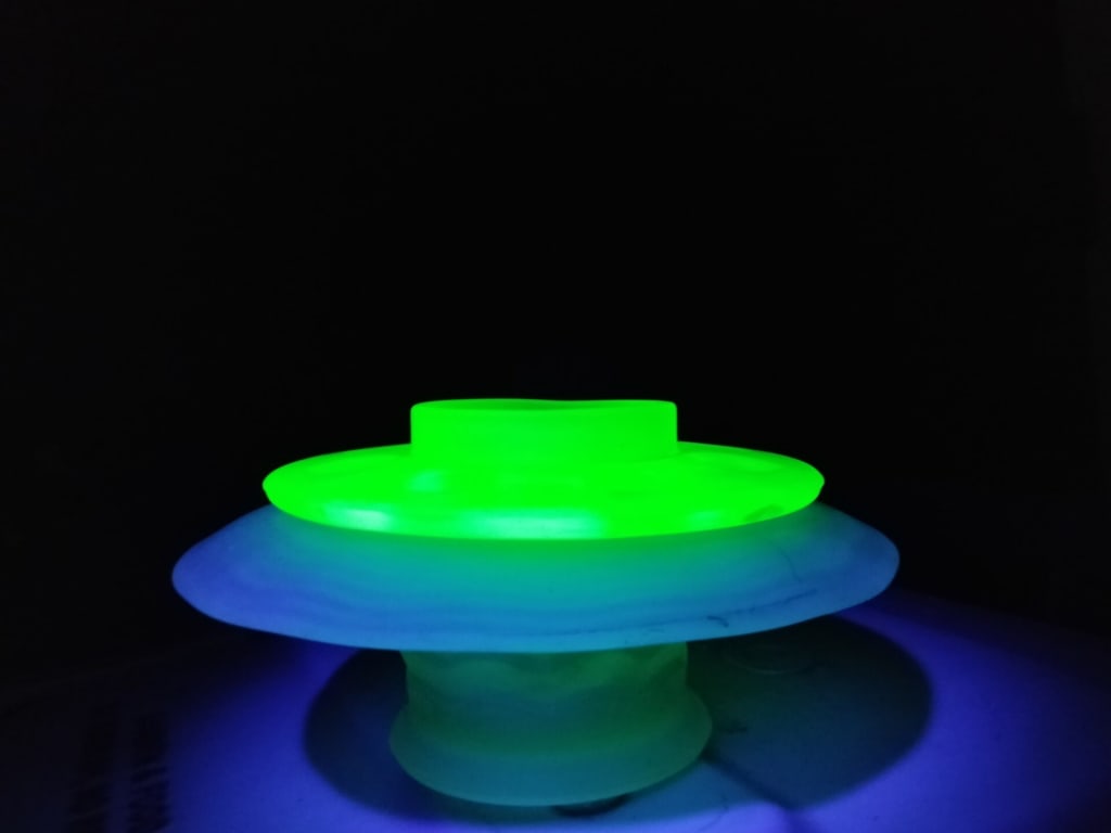 URANIUM GLASS FLOWER FROG &amp; GREEN GLASS POSY VASE — NZ auction result