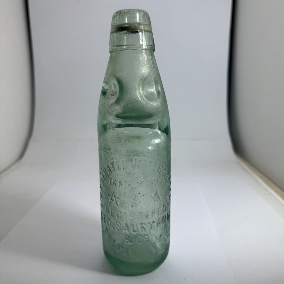 Codd. Geo. Saurmann & Co., Fremantle. Three Stars. Star Aerated Water Factory. M base mark. 6 oz size. (Western Australia)