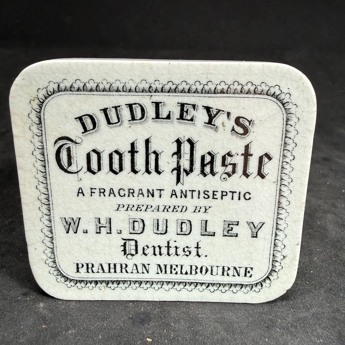 Pot Lid. Dudley's Tooth Paste. W. H. Dudley, Dentist, Prahran. Rectangle. (Victoria)