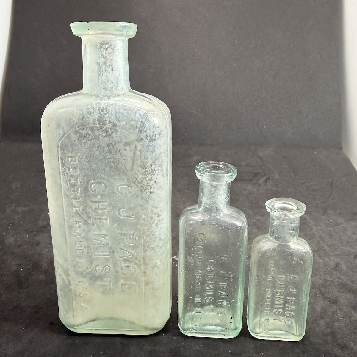 3 Chemists. G. J. Page, Chemist. (Bundaberg & Brisbane). Three sizes, 6, 1 & 1/2 oz. 153, 90 & 72 mm. Large one is mistakenly C. J. Page. (Queensland)