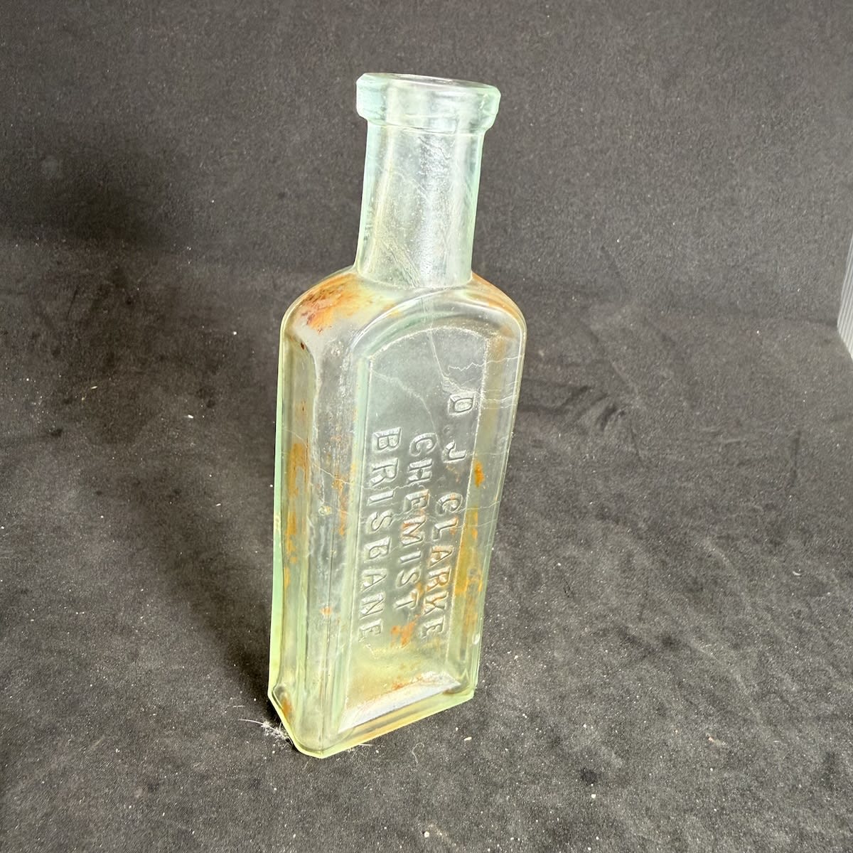 Chemist. D. J. Clarke, Brisbane. 2 oz. Panelled cough cure shape. 127 mm. (Queensland)