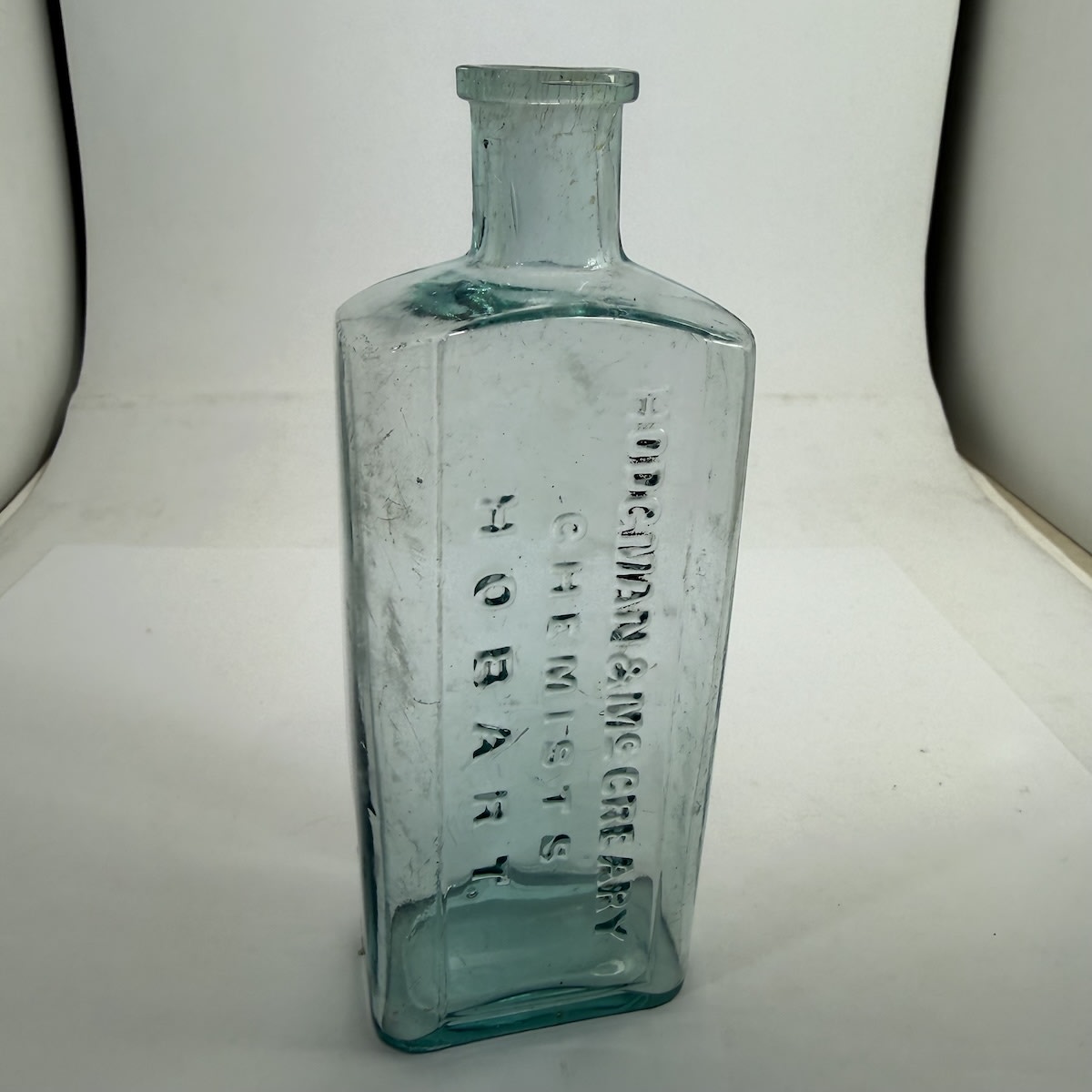 Chemist. Hodgman & McCreary, Hobart. Blue Aqua. 6 oz. 161 mm. (Tasmania)