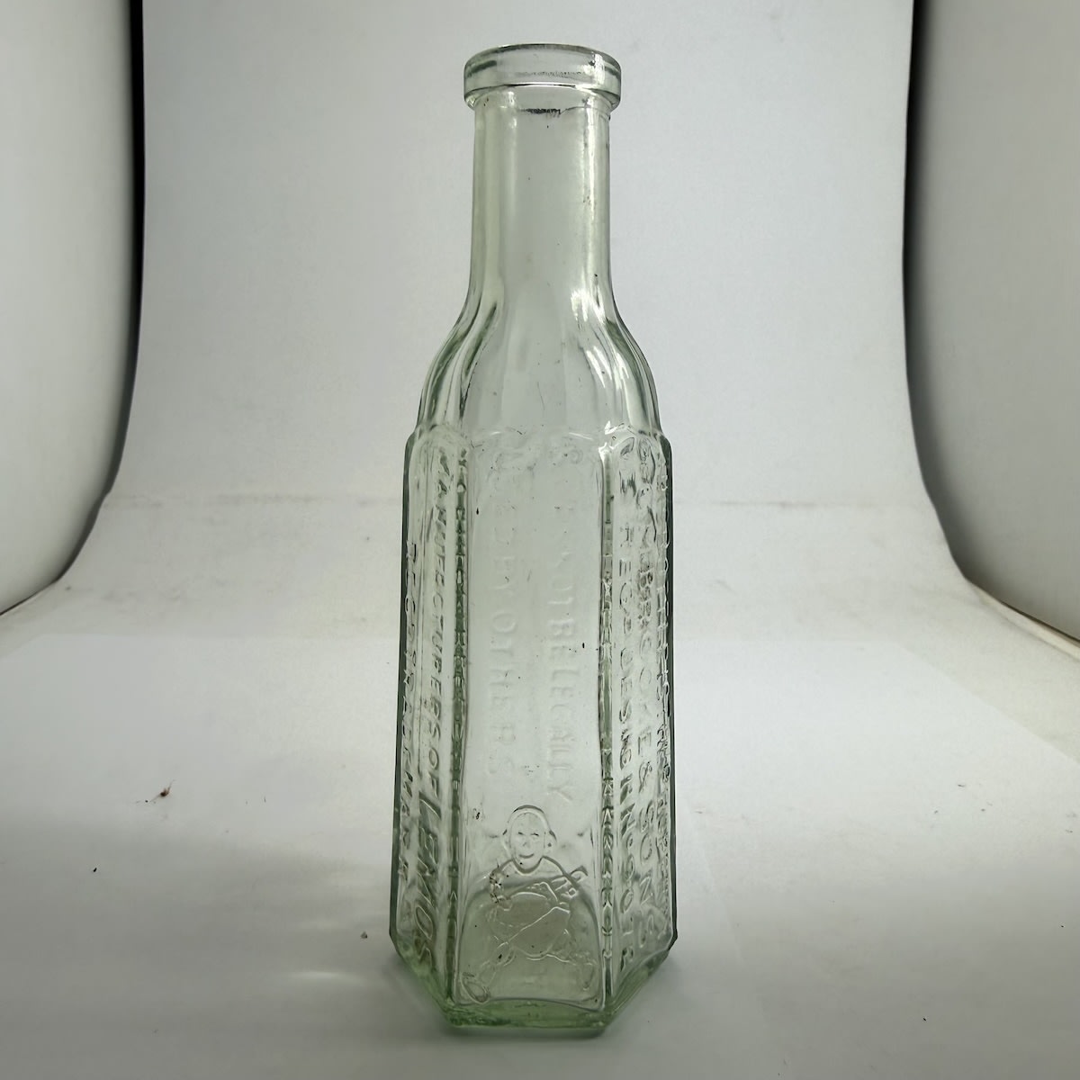Sample Cordial. C. M. Brooke & Sons. Lemos. Lemon man. Aqua 3 oz.