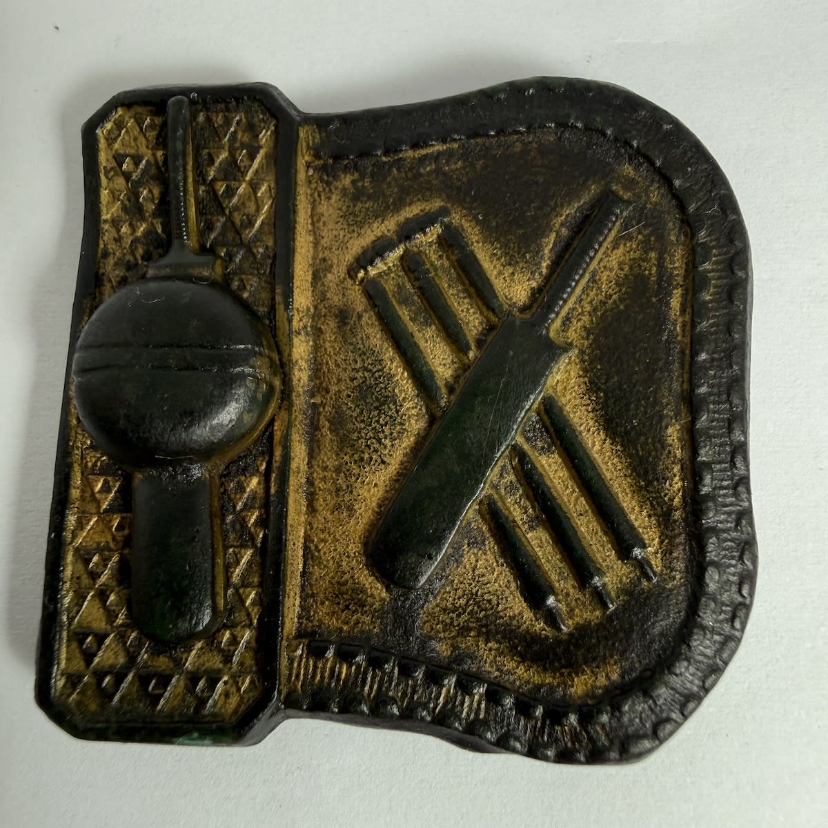 Cricket Belt Buckle. Crossed Bat & Stumps. Bat with ball in centre. Small size. A lot of gilt finish still in place. Indistinct British Registration Diamond on the back.