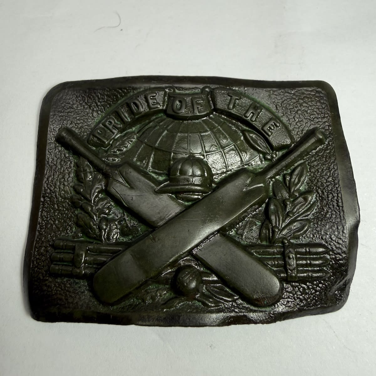 Cricket Belt Buckle. Pride of the World. Globe pictorial. Cap, Crossed bats, stumps & ball.