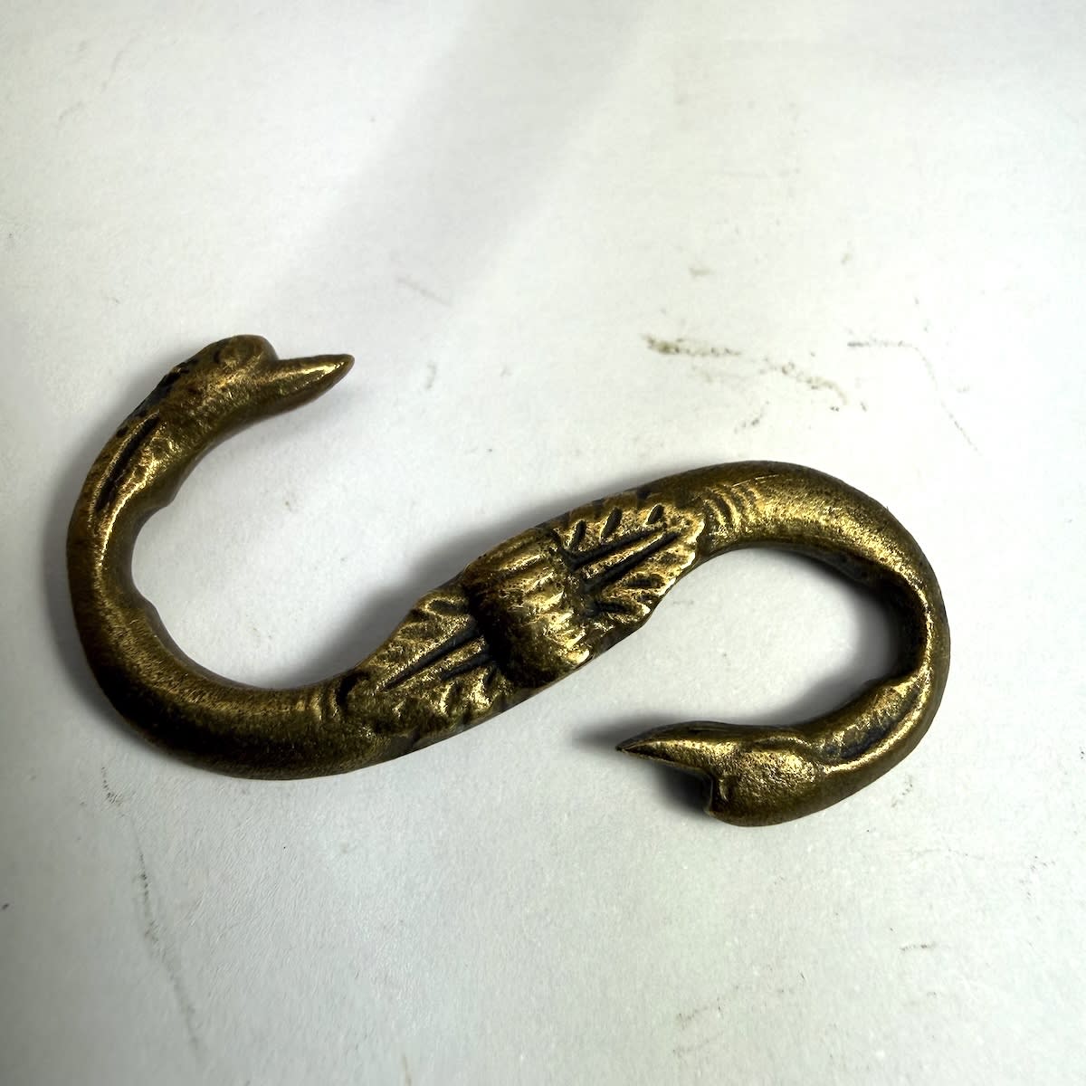 Snake bucle or actually Swan buckle. Very small type with fine detail.