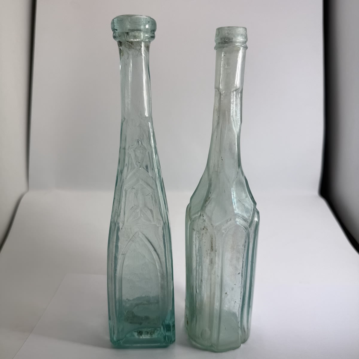 2 Goldfields Bottles: Square American Gothic Pepper Sauce with tube pontil scar; Anthony Thatcher style Salad oil.