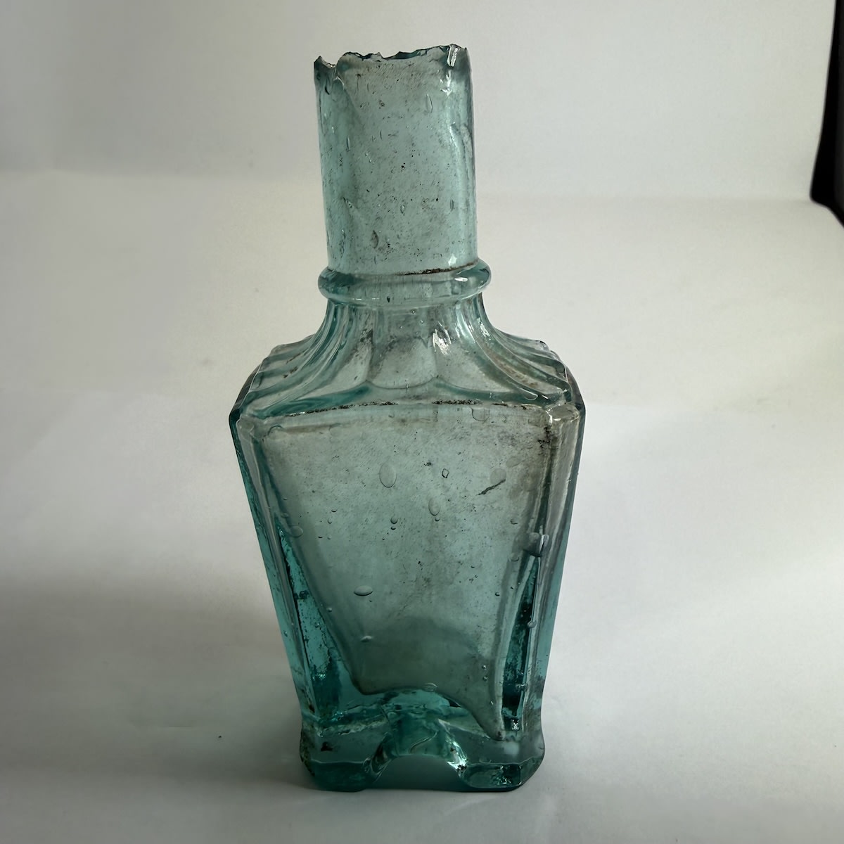 Small fancy shaped shear lip perfume or confectionery etc. 168 embossed on base. Blue Aqua. 1 oz. 106 mm.