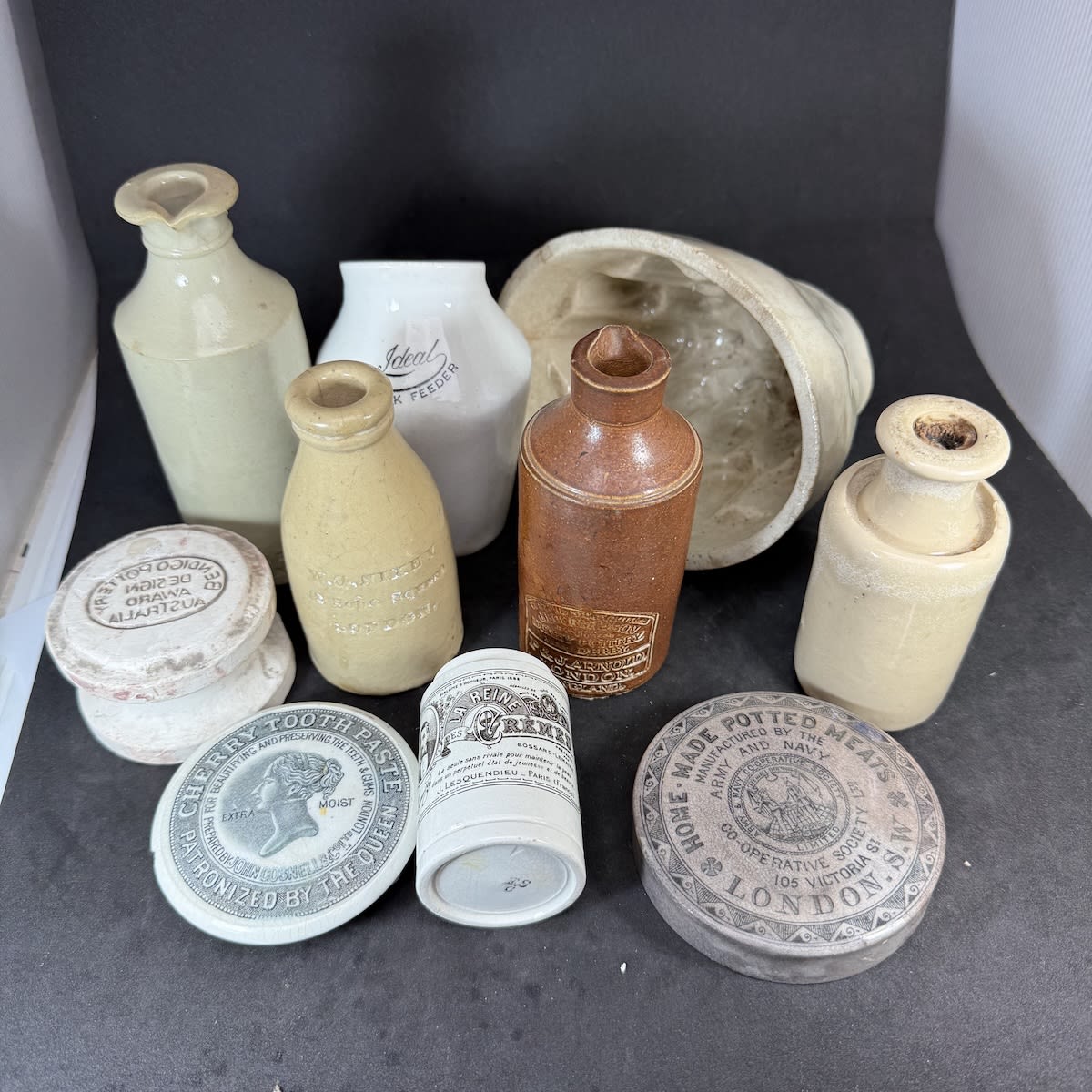 10 Pottery Items: Jelly Mould; 4 Stone Inks including Nixey, Arnold, Non-spill & Field; Ideal Sick Feeder; Army & Navy Potted Meats Lid; Queens Head Pot Lid; La Reine pot; Bendigo Pottery item.
