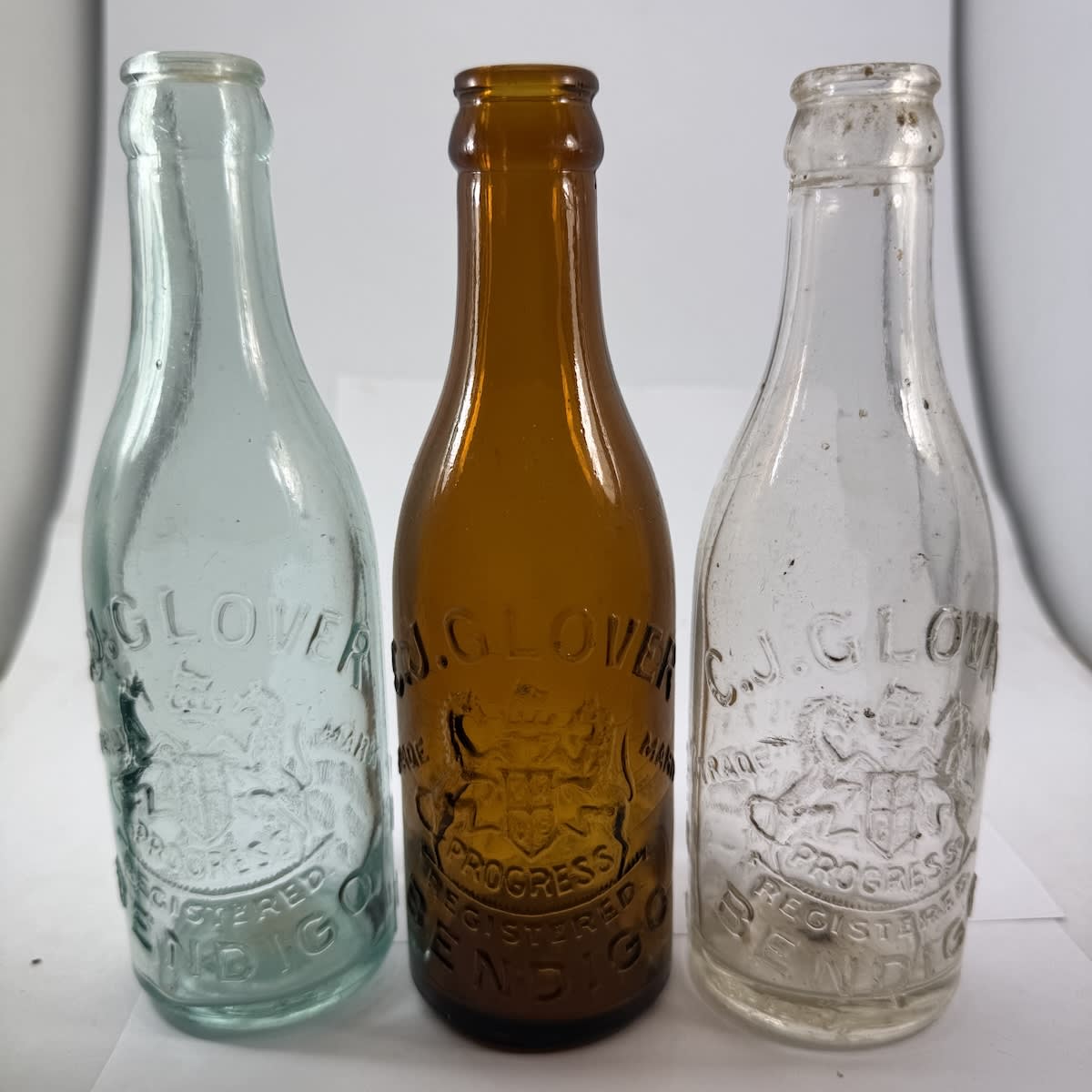 3 variations of C. J. Glover, Bendigo Crown Seals. Coat of Arms. Aqua, Amber & Clear. (Victoria)