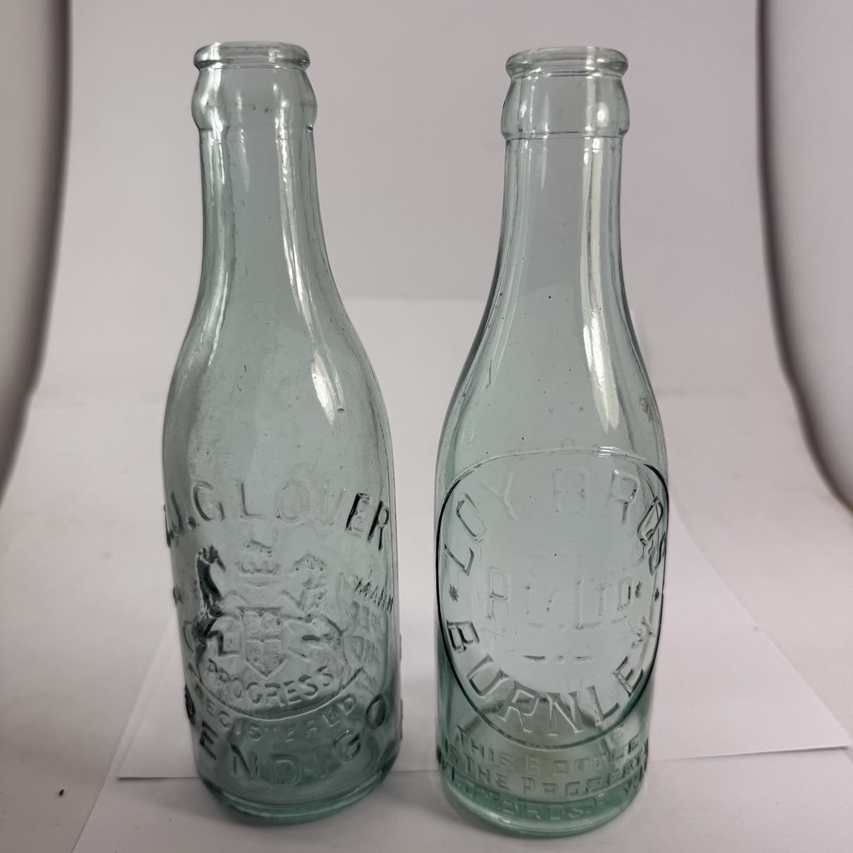 2 Small Crown Seals: C. J. Glover, Bendigo; Loy Bros Pty Ltd Burnley. (Victoria)