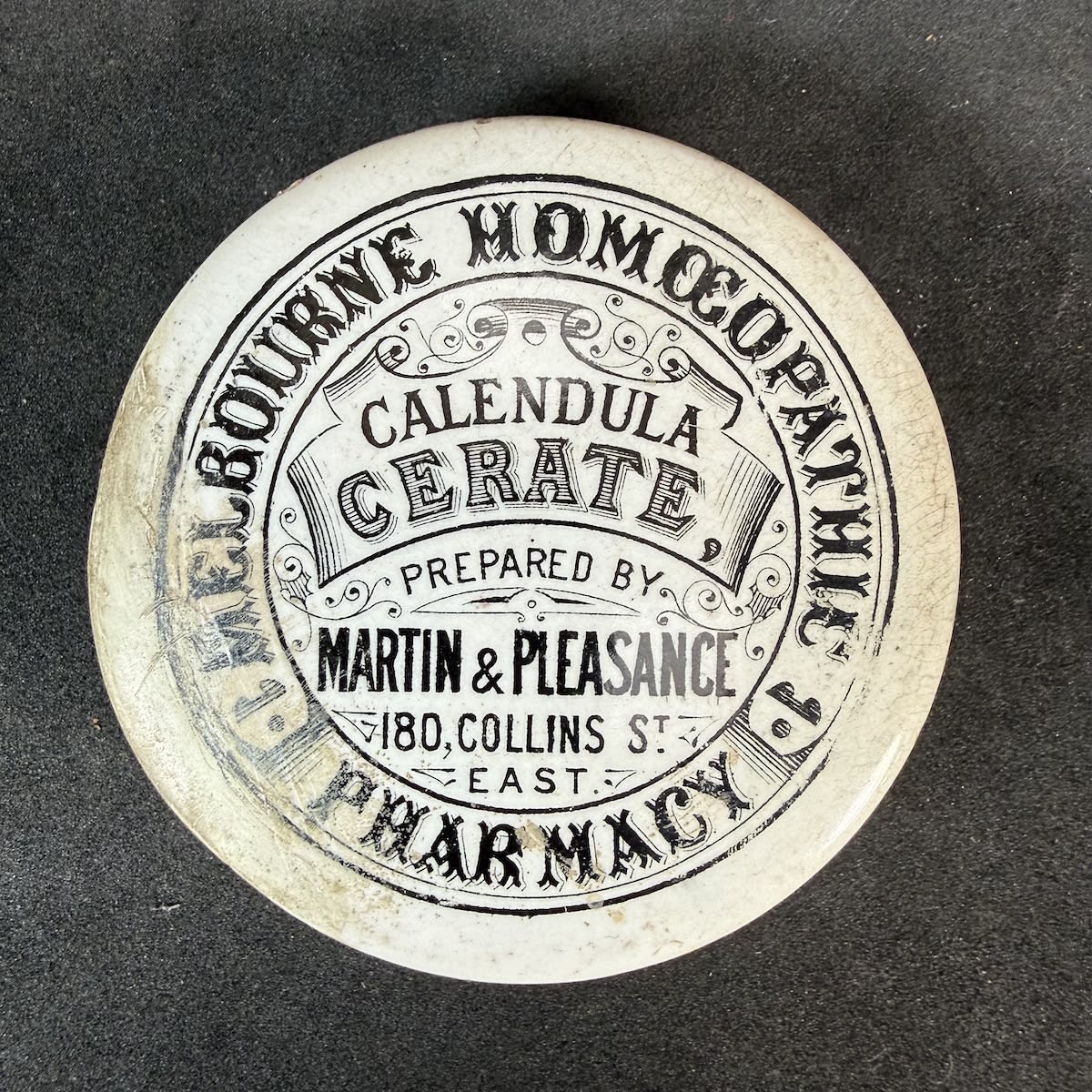 Pot Lid. Martin & Pleasance. Melbourne Homeopathic Pharmacy, 180 Collins St East. Calendula Cerate. Small size. (Victoria)