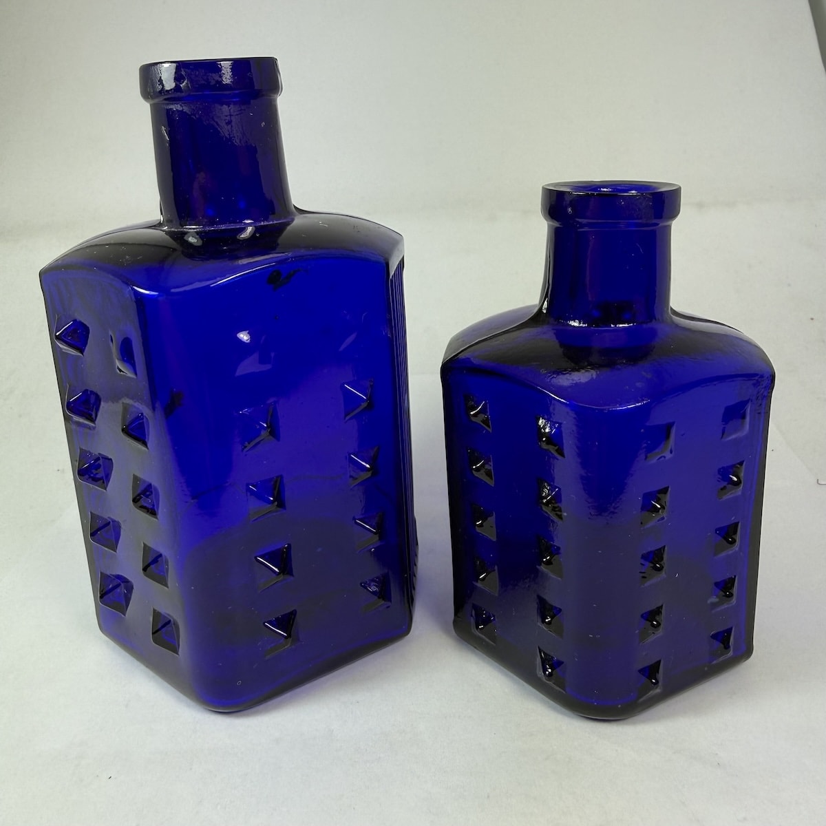 2 Poisons. British Drug Houses Hobnail Poison. Cobalt. Larger (116 mm) with indented label space on the back; Smaller (90 mm) with regular plain back. Both have BDH in a Diamond on the base. (United Kingdom)