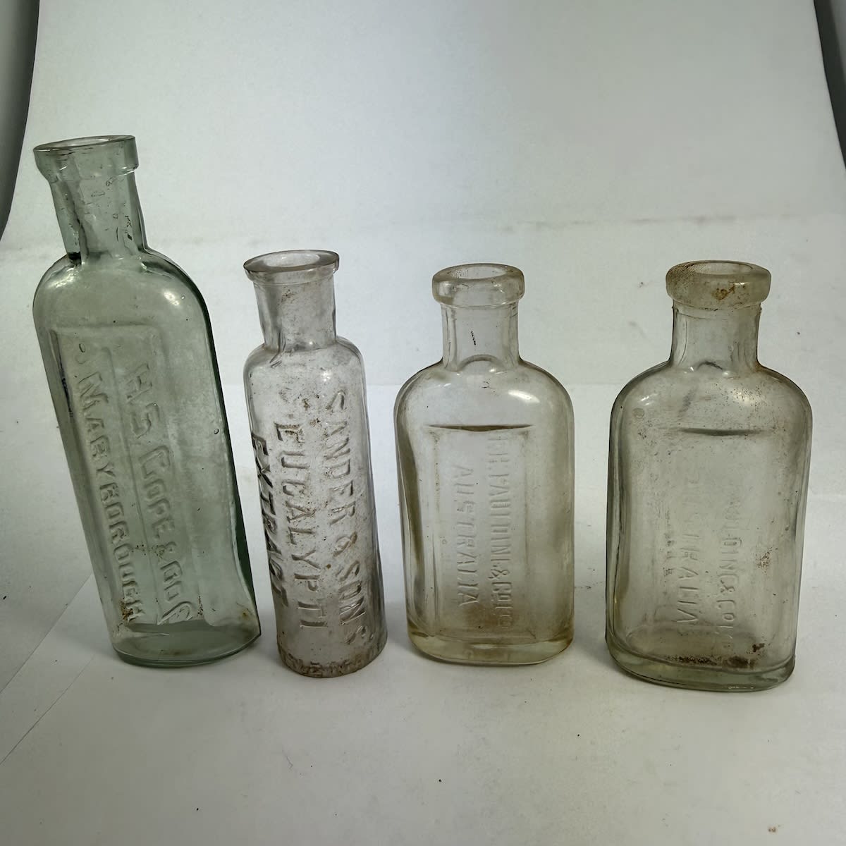 4 Small sized Eucalyptus Oils: H. S. Cope & Co Maryborough; Sander & Sons; 2 x F. H. Faulding & Co Ltd.