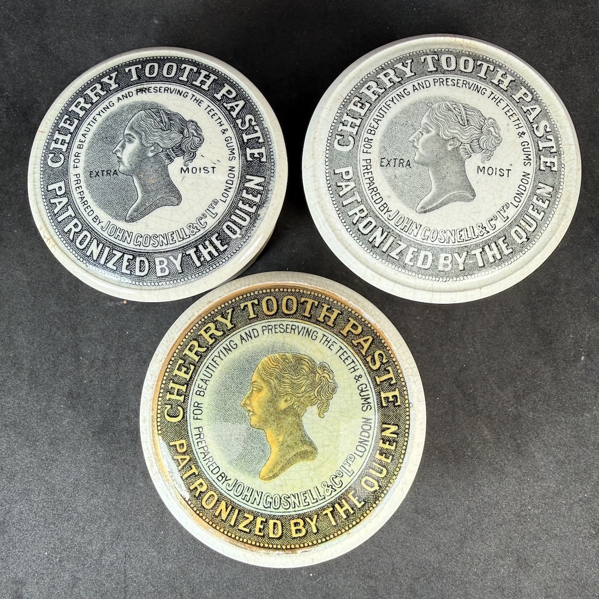 3 John Gosnell & Co Ltd Cherry Tooth Paste Queens Head Pot Lids: 1 x Coloured; 2 x Black & White. One with correct type of base, other two with fitting but straight sided bases.