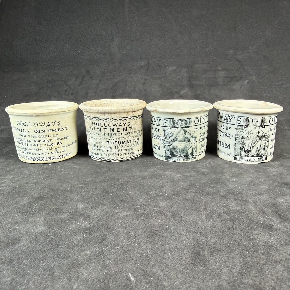 4 Holloways Ointment Pots: Family Ointment, 244 Strand; 533 Oxford, late 244 Strand writing only Pot; 2 x Pictorial 533 Oxford St Pots.