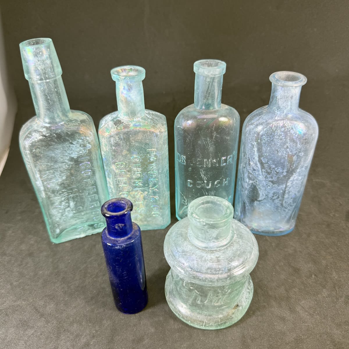 6 Small Bottles: Tricopherous; Pardey & Co Chemists Geelong; Dr Jenners; Plain early oval; Small Cobalt Vial; Stephens Ink.