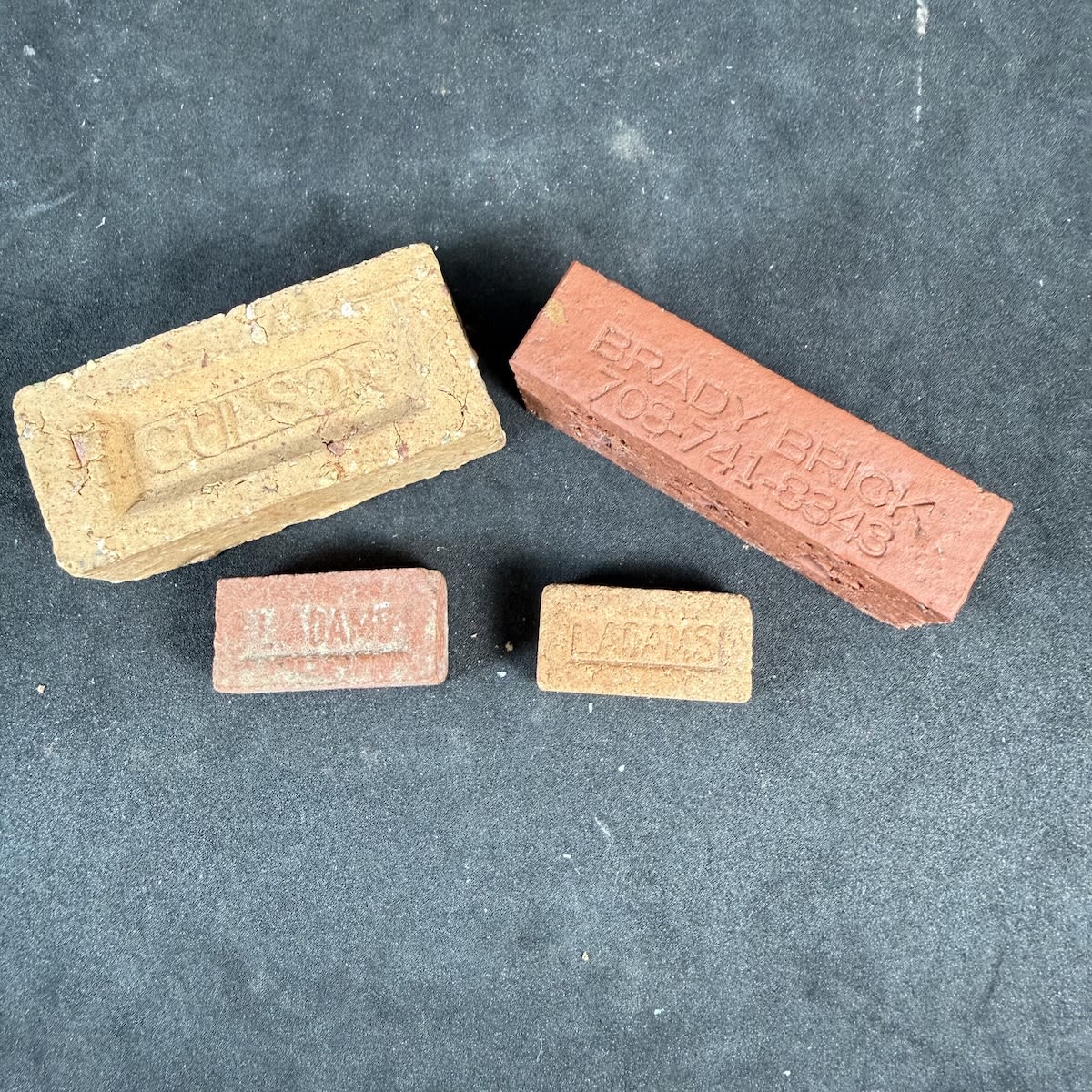4 Sample Bricks: 2 really small ones: Gulson and Brady Brick and two ridiculously tiny ones both with L. Adams embossed.