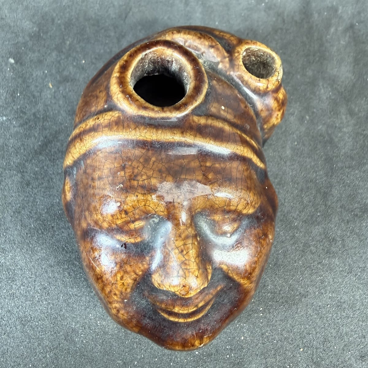 Bennington Glazed Pottery Inkwell. Figural of Mans head with sleeeping cap on. Inkwell & Pen holder.
