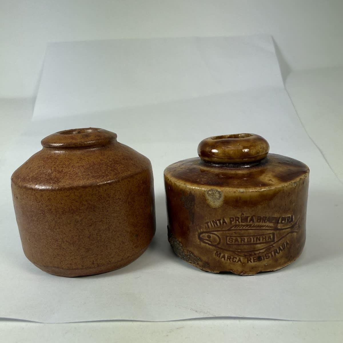 2 Penny Inks: Unusual moulded "modern" looking one; The other impressed - Tinta Prima Brazileira, Sardine trade mark!