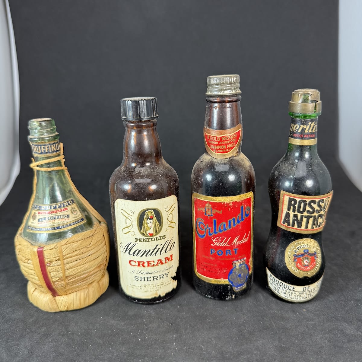 4 labelled Miniatures: Penfolds Sherry; Orlando Port; Rosso Antico; Ruffino Chianti.