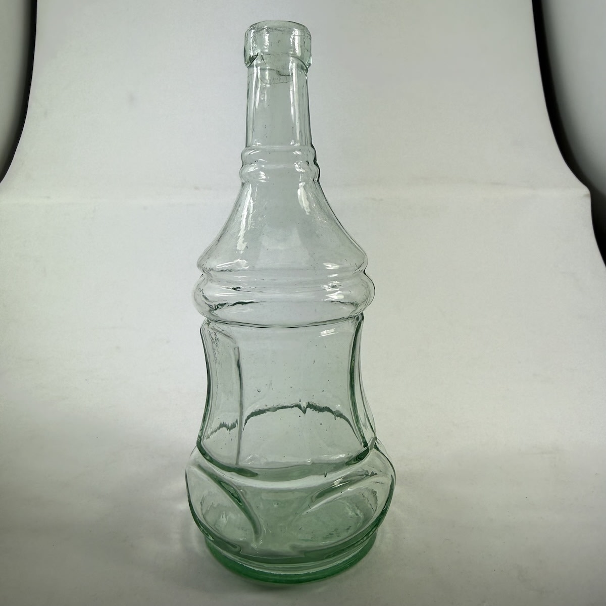 Goldfields Salad Oil. Hourglass shape. Very faint round pontil scar to base. Aqua. 4 oz. 144 mm.