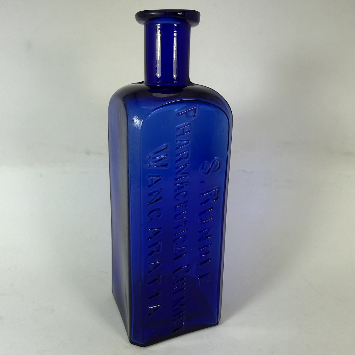 Chemist/Poison. S. Rundle, Phramaceutical Chemist, Wangaratta. Whitall Tatum & Co. Cobalt Blue. 8 oz. 160 mm. (Victoria)