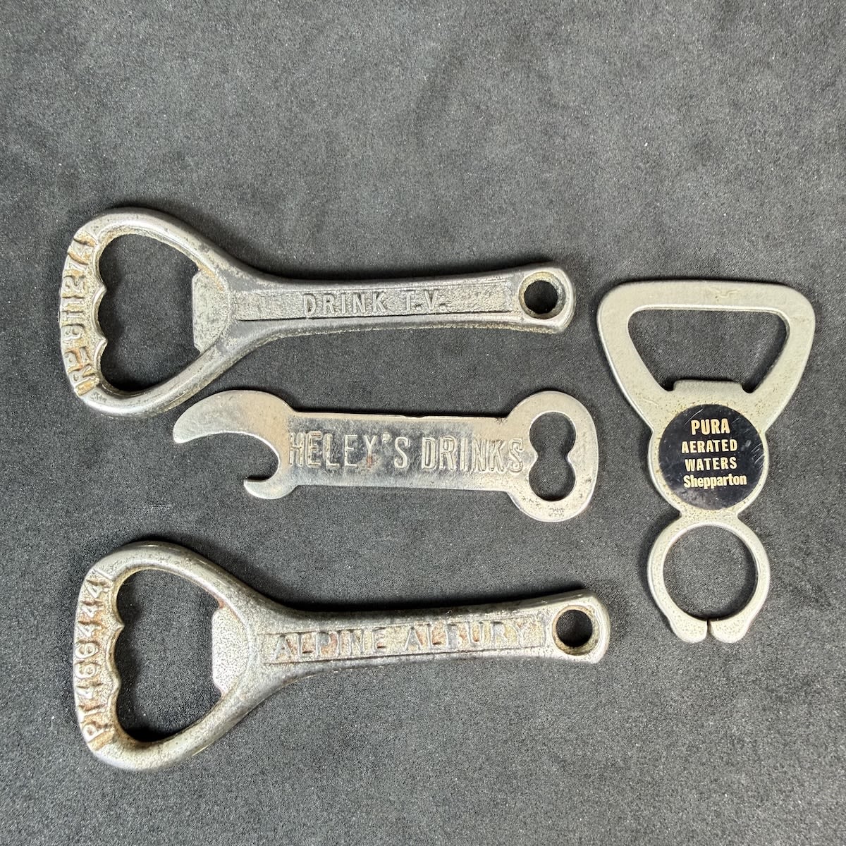 4 Crown Seal Bottle Openers: Drink T. V. Geelong; Alpine Albury; Heley's Drinks; Pura Aerated Waters Shepparton. (Victoria & New South Wales)