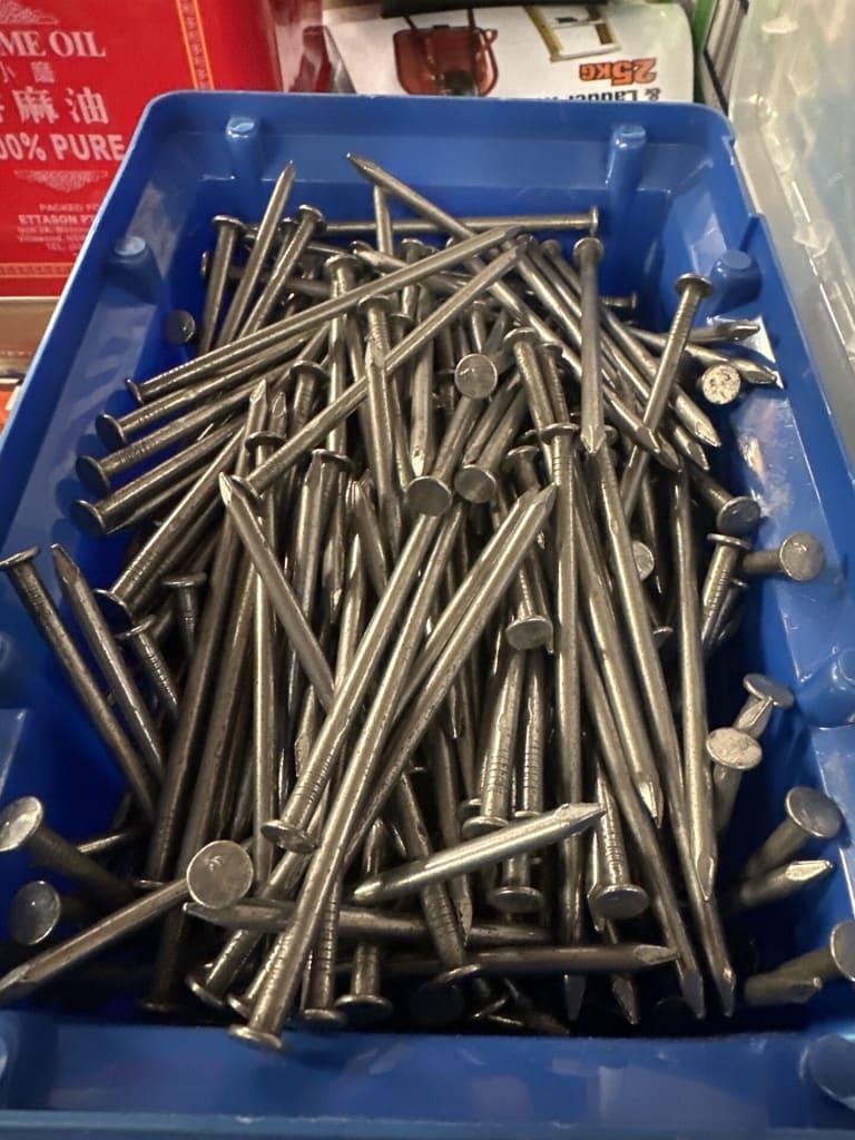 TUB OF FLAT HEAD BRIGHT NAILS — NZ auction result