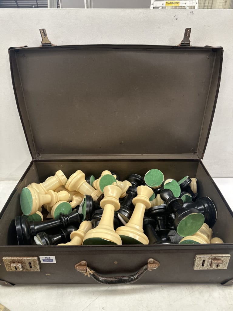 SUITCASE &amp; OVERSIZED CHESS PIECES — NZ auction result