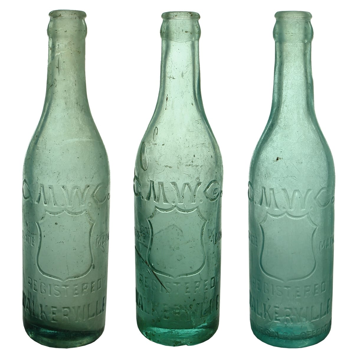 3 Crown Seals. C. M. W. Co Walkerville. Greyish Aqua & Aqua plus a bluish one with extra embossing around the base and heel. (South Australia)
