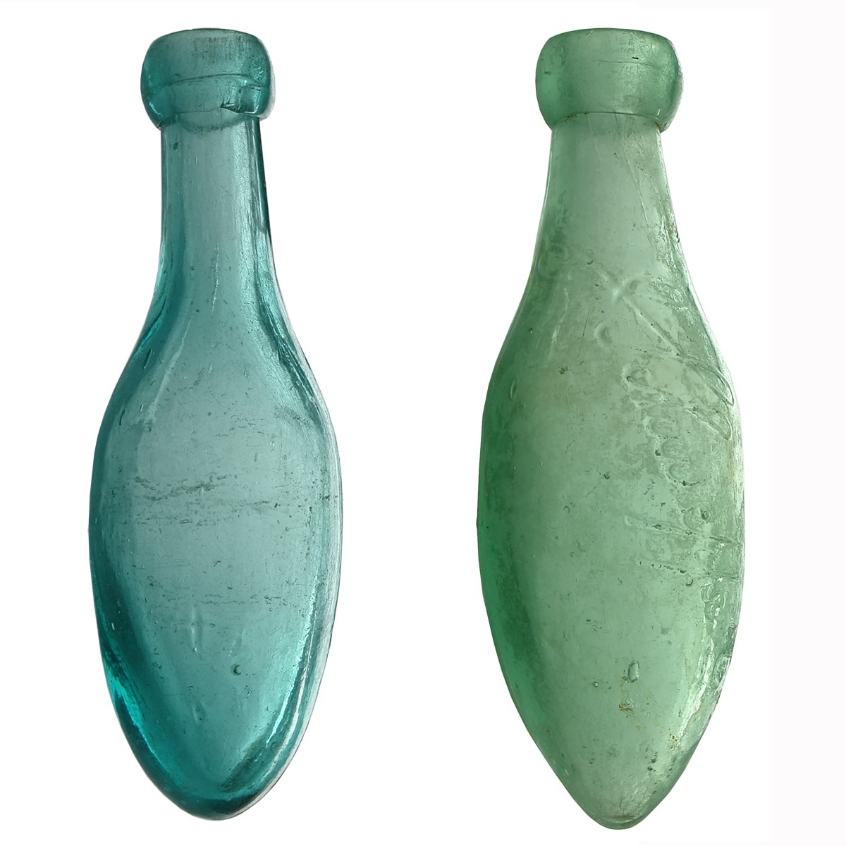 2 Torpedos. Plain light blue one with a + down low on both sides; J. Schweppe & Co Ltd in script.