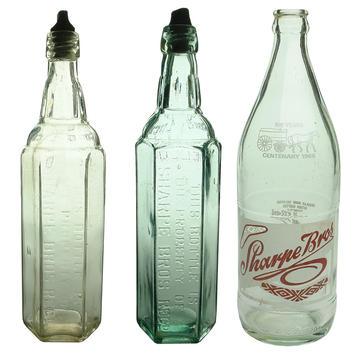 3 Sharpe Bros Bottles. 2 x Internal Threads, Clear & Aqua. Fancy shapes; Ceramic Label Crown Seal. 100 years 1968. 700 ml.