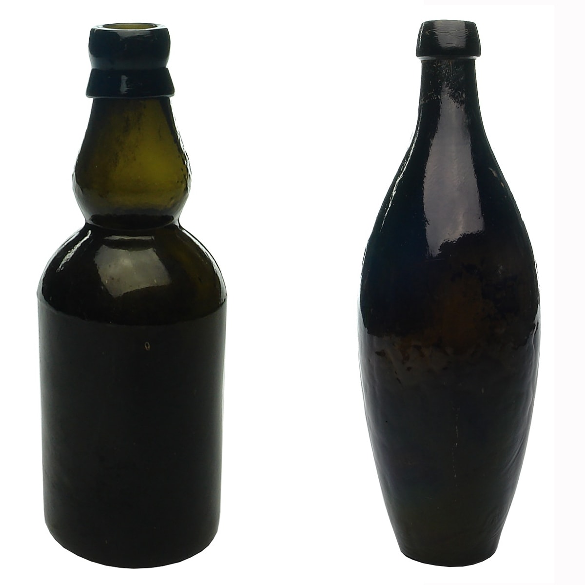 Black Glass. 1. Sample size dumpy black with bulged neck. 2. Large black skittle.