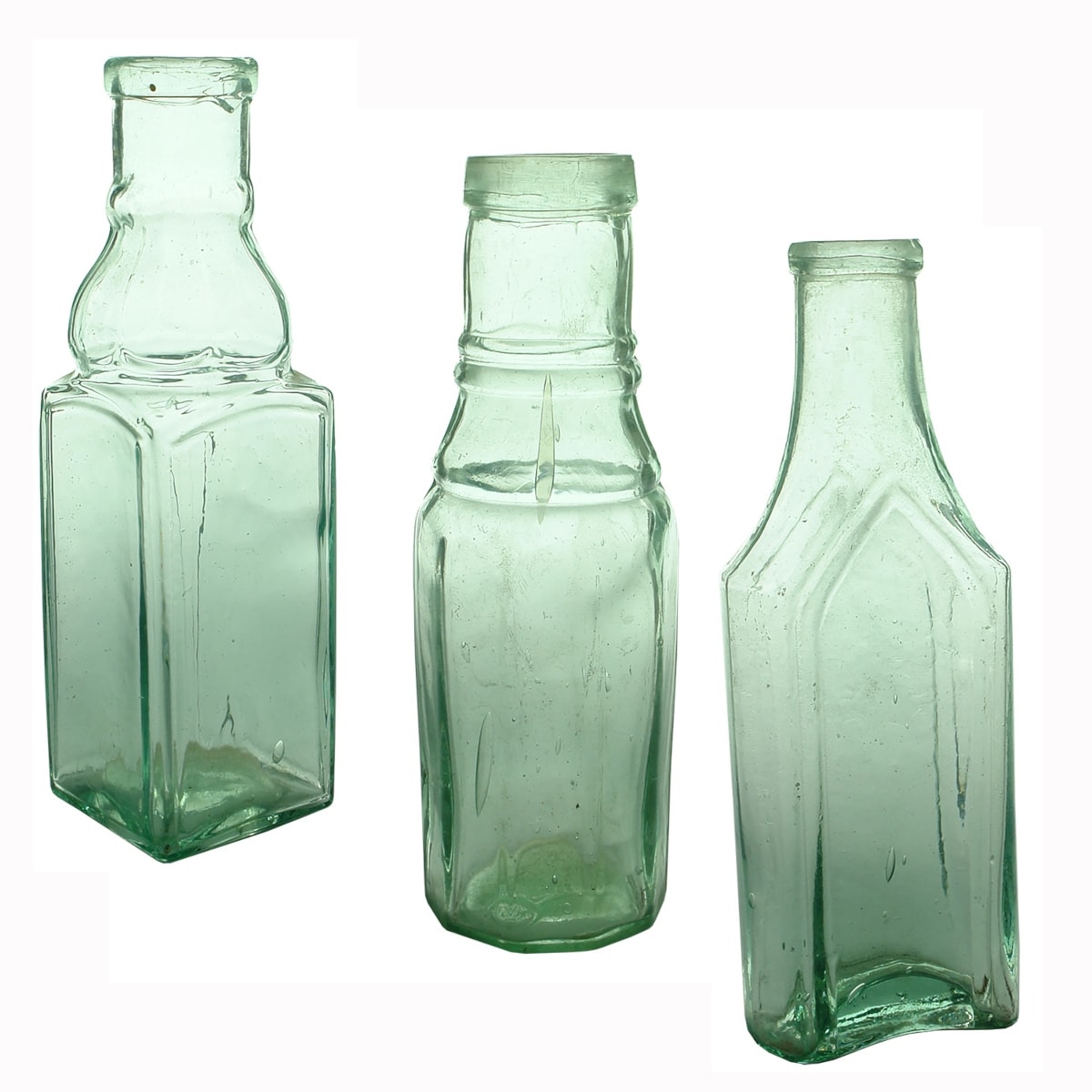 3 Goldfields type bottles: Lobed neck pickle with raised panels to all four sides; 10 sided pickle with Registration Diamond to base; Mustard Sauce with Arched sides.