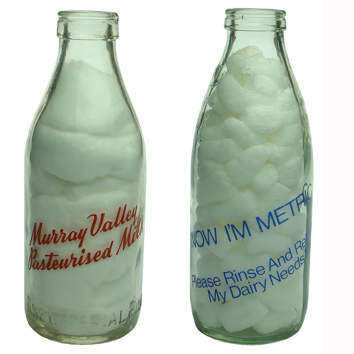 2 Ceramic Label Milk Bottles: Murray Valley Pasteurised Milk; Now I'm Metric. Pints. (Victoria)